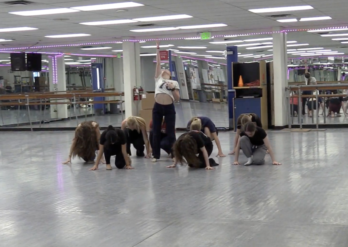 Dasha Fallon's group performs her dance for the rest of Advanced during rehearsal. 
